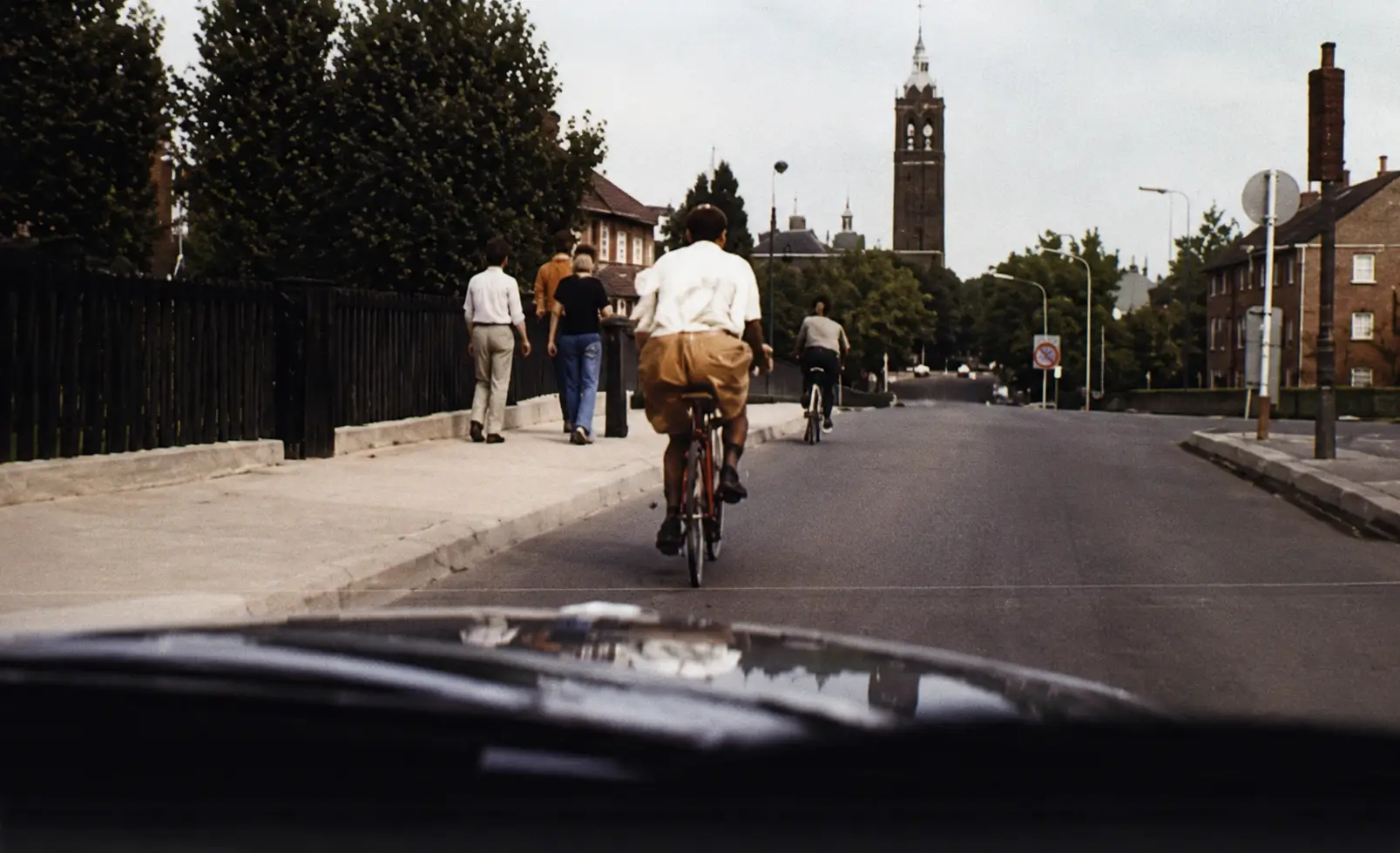 Cyclist with carrier on road