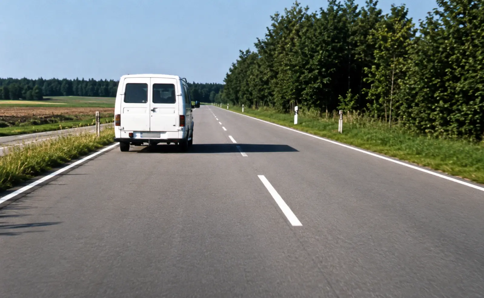 Van on road ahead