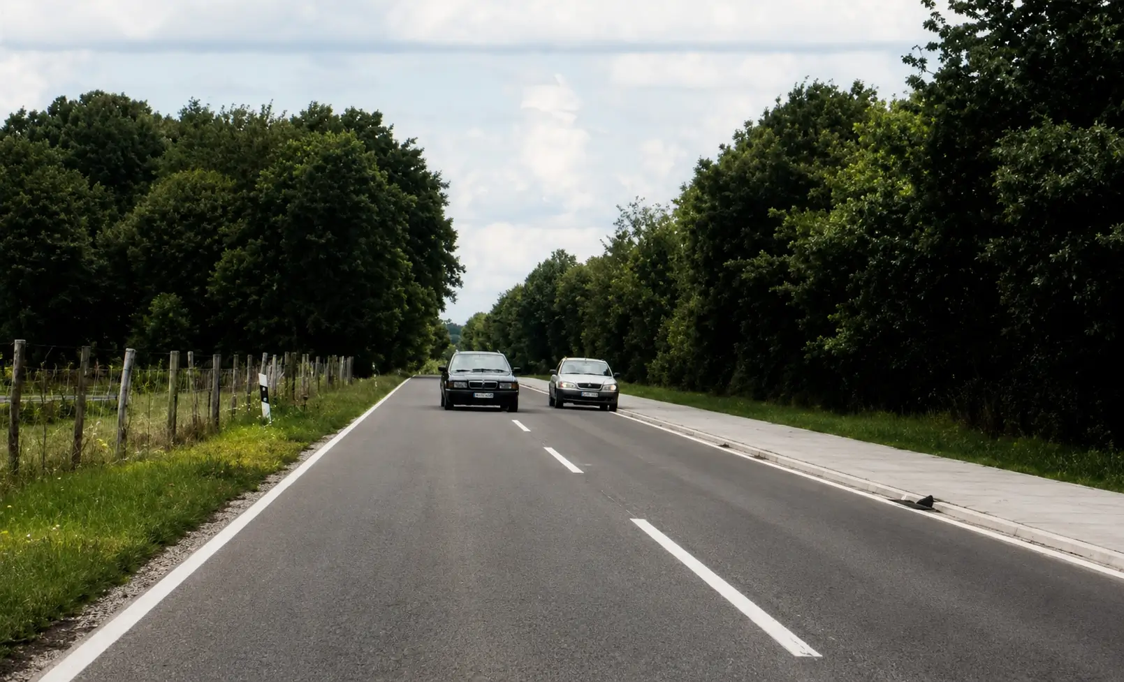 Oncoming car overtaking on road