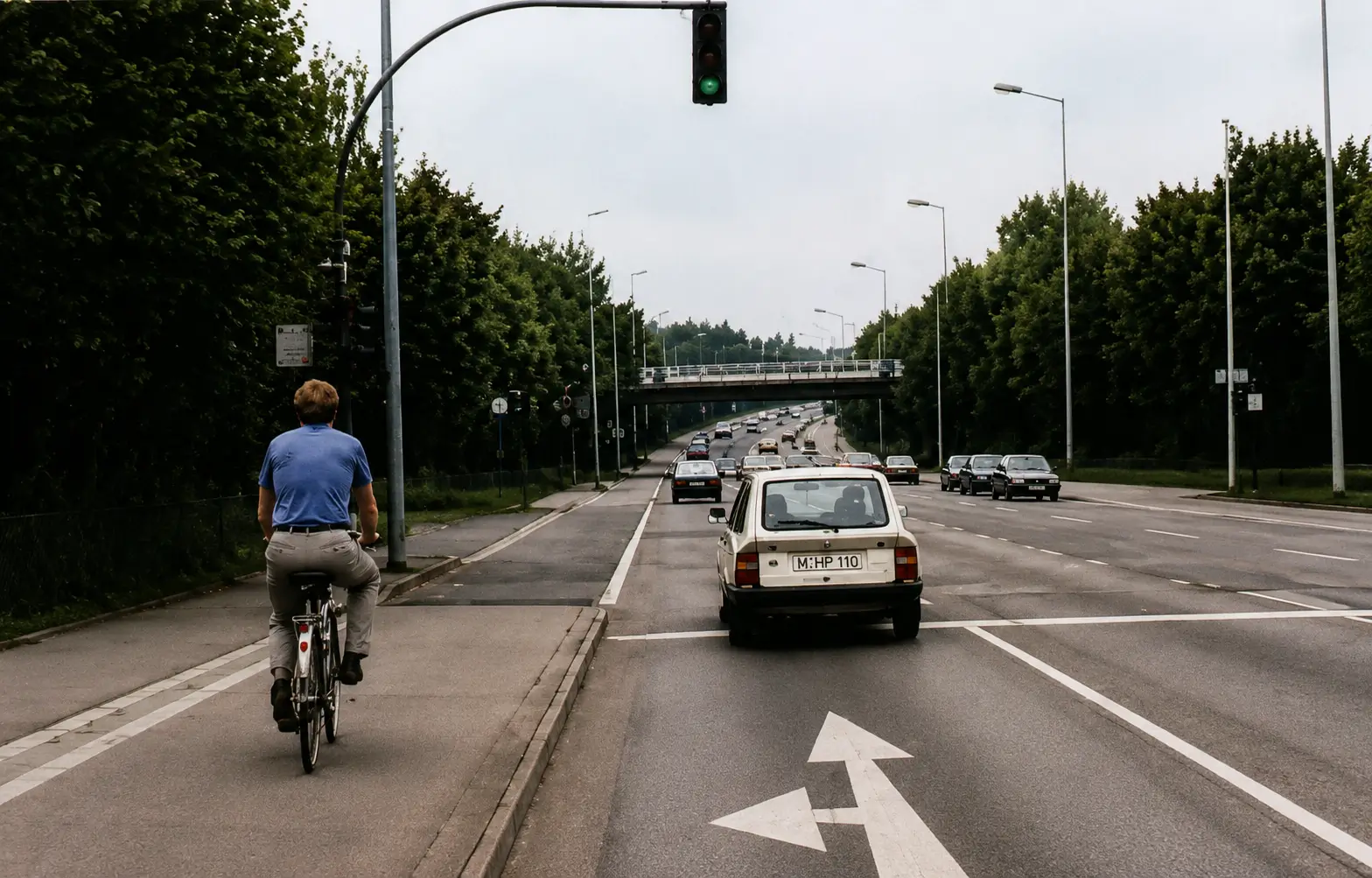 Intersection with cyclist and car
