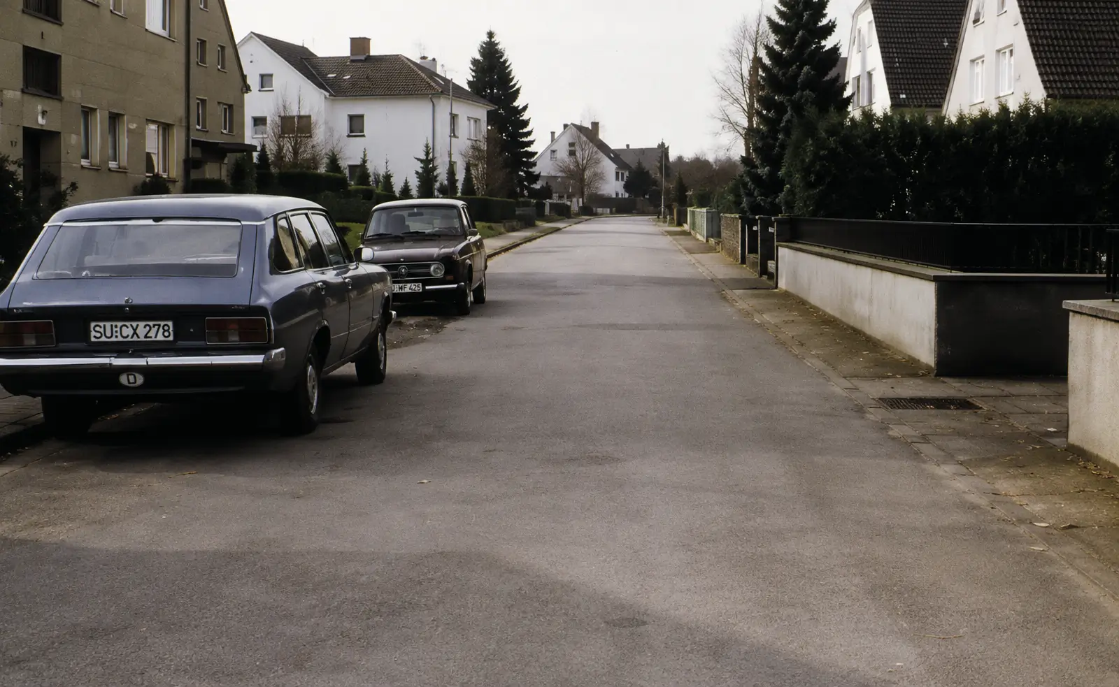 Photo of parked cars on road