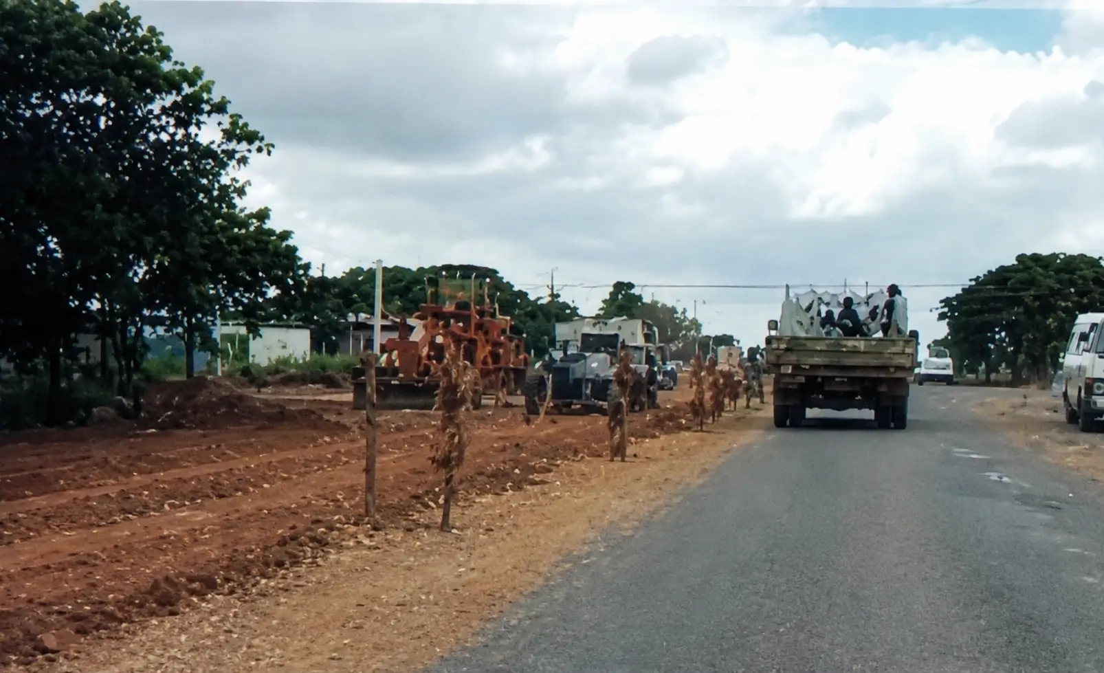 road workers constructing the road on the side