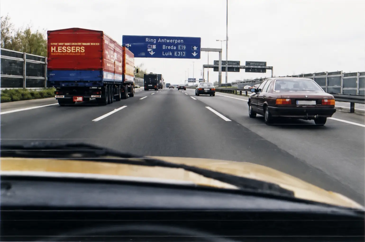 multi-lane high way with cars on both left and right side